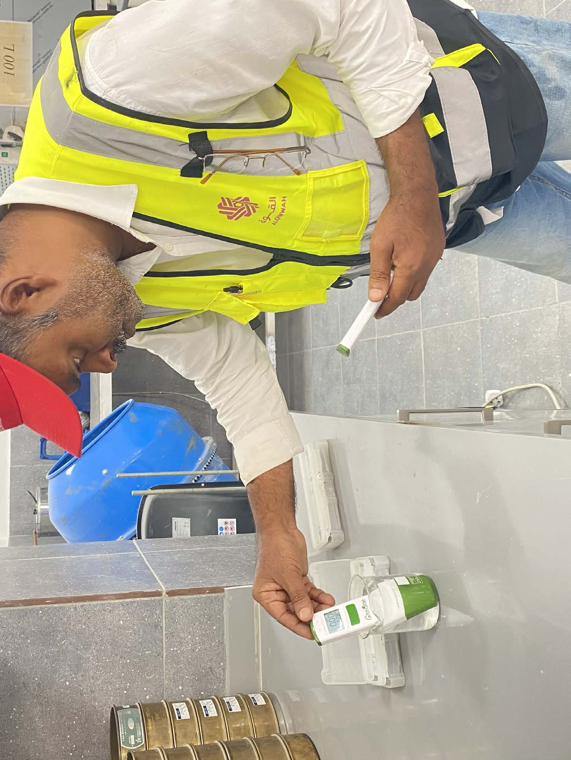 Laboratory technician performing a concrete quality test